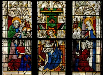 Window depicting the Virgin and Child Enthroned: also the donors with their patron saints (St Peter and St Barbara)