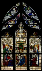 Window depicting the Virgin and Child Enthroned: also the donors with their patron saints (St Peter and St Barbara)