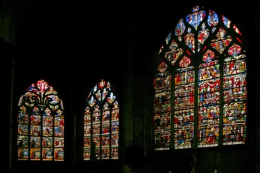 Window depicting the east end of the church with the main east window in the center