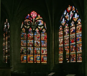 Window depicting the east window (right) and the Creation window in the center