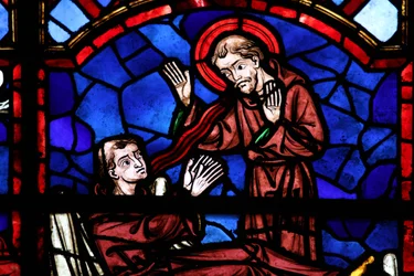 Window depicting a sainted monk appears to St Martin