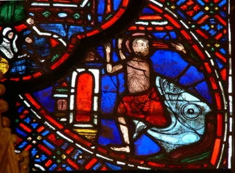 Window depicting Jonah emerges from the whale