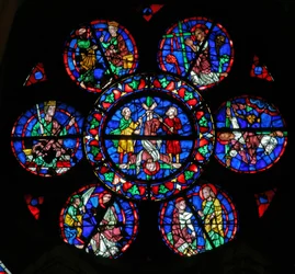 Window w102 depicting the arrest and death of St Peter, and the saint with Simon Magus