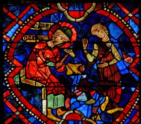 Window w107b depicting St Eloi makes a cup