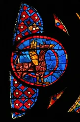 Window w115 depicting a winged beast