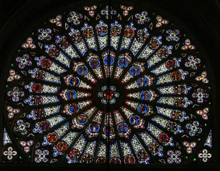 Window w121, the north rose window, depicting Apostles, Evangelists, bishops, kings, martyrs, St Peter and St Paul (rose window - internal)