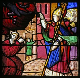 Window depicting the Life of St Remi. He delivers a possessed soul