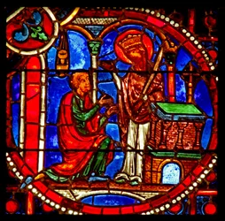 Window depicting a scene from the Theophilus story: he prays before a statue of the Virgin who then appears to him