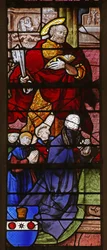 Window w21 depicting a donor and his sons with St Peter