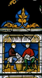 Window w25 depicting a draper at work in the Drapers window
