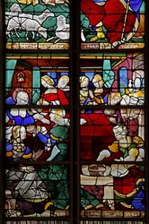 Window depicting a scene from the Life of the Virgin Mary: her birth with numerous people, midwives etc