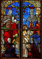 Window depicting donors with St John the Baptist; also St Anne teaching the Virgin Mary to read