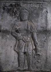 Capital of the Nautes Pillar depicting Vulcan holding a hammer