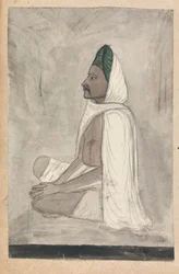 Man in a Green Turban Sitting Crosslegged