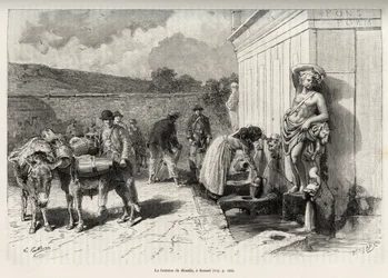 The fountain of the Rossello, in Sassari (Italy). Daily activities, woman filling a criche and water bearers with their donkeys, filling their barrels. Engraving and story 
