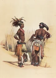 Two young Zulu men, adorned in vibrant traditional attire
