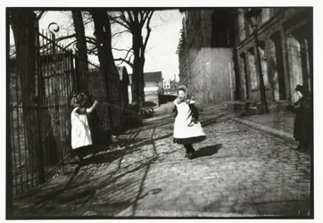 Children Playing in Front of Breitner