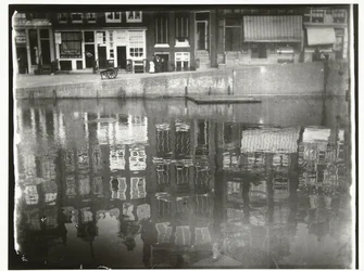 Reflection of Canal Houses in the Water at Singel 377 to 385 in Amsterdam