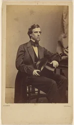 Man Seated, Holding a Top Hat