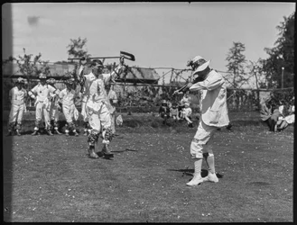 Members of the Bampton Morris troupe performing a dance