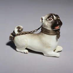 A Meissen pipe-bowl modelled as a seated pug-dog, c.1745