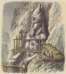 Carving a Statue of an Ancient Egyptian Pharaoh Out of a Rock Face