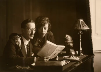 Married Couple Reading a Book