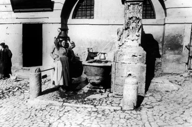 Women at a Fountain
