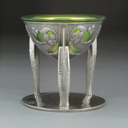 A Tudric pewter and glass coupe