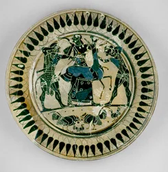 Attic black-figure plate decorated with a scene of Heracles and Apollo fighting over a deer and being separated by Artemis, in the manner of Lydos, from Greece