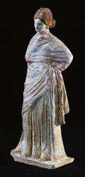 Statuette of a woman with draped clothing, from Tanagra, Boeotia