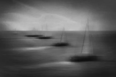 Blurred Sailboats at Sea