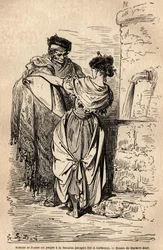 Man and woman of the people at the fountain in Carmona