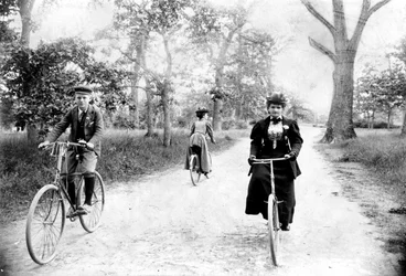 Maynard MacDonald and his grandmother, Hannah Maynard, cycling in Beacon Hill Park, Victoria, c. 1895