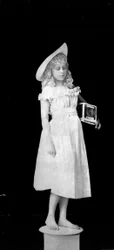 Statuary from Life; Girl Holding Birdcage