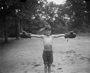 Young Boy with Boxing Gloves