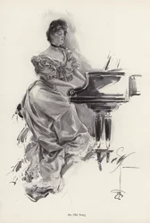 Woman playing a song on a piano