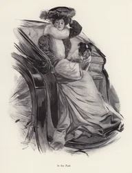Woman sitting in a carriage with her dog