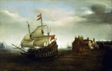 A Dutch boat sailing near a castle, near a rocky coast