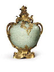 One of a pair of Louis XV style vases and covers, mounts dated 1883, porcelain late eighteenth- early nineteenth century