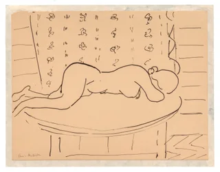 Female Nude Lying Facedown on a Table