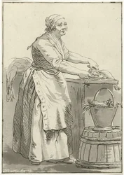 Woman Cleaning Fish
