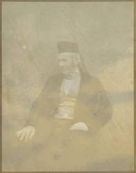 Portrait of a Seated Man in a Cap