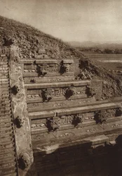 Mexico: San Juan Teotihuacan, Stone sculptures on the western facade of the pyramid of Quetzalcoatl, pyramid at the center of the Citadel