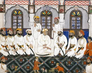 A Jaipur raja dressed for worship in durbar
