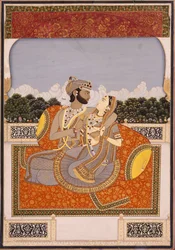 A couple embrace on a terrace