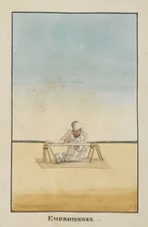 Embroiderer seated at his frame