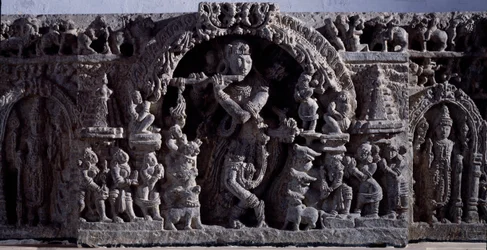 Hinduism: Krishna as Venugopala. Black stone sculpture, central part, 12th century - from Halebidu, Mysore - Calcutta, Indian museum
