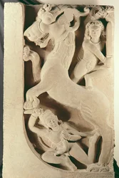 Warriors fighting a lion-griffin