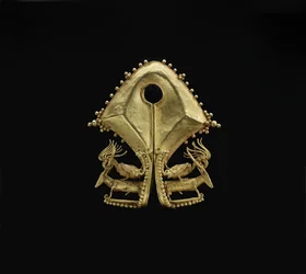 Mamuli, pendant with cockatoos riding deer, Sumba Island peoples, c. 19th century